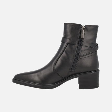Women's high-heeled ankle boots in black leather with metallic decoration
