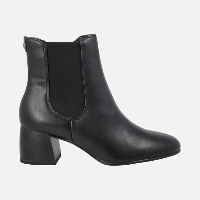 Black high-heeled ankle boots with elastic and zipper