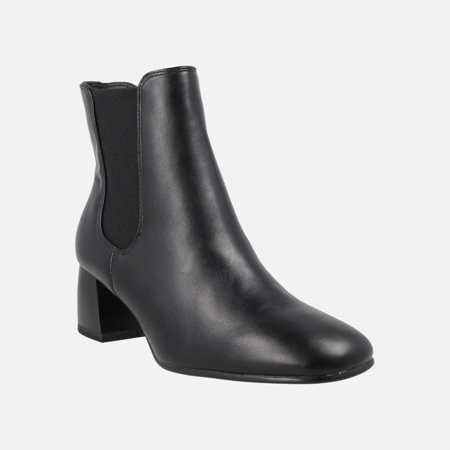 Black high-heeled ankle boots with elastic and zipper
