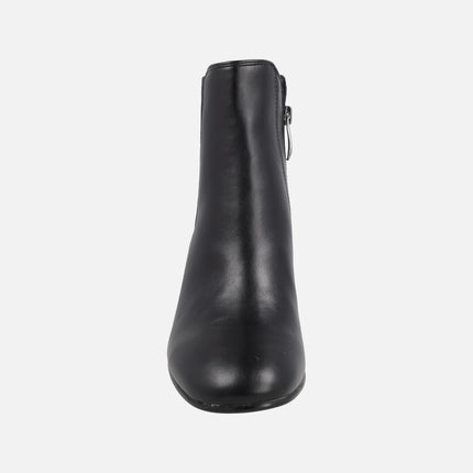 Black high-heeled ankle boots with elastic and zipper