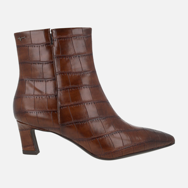 Women's heeled ankle boots in crocodile effect finish