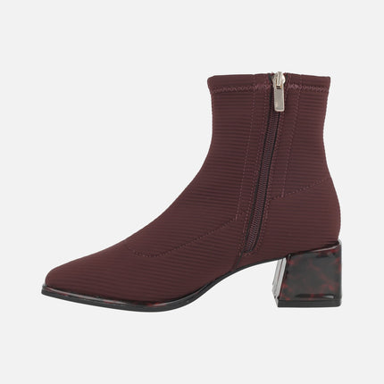 Ankle boots in elastic fabric with tortoiseshell effect heels