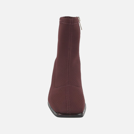 Ankle boots in elastic fabric with tortoiseshell effect heels