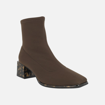 Ankle boots in elastic fabric with tortoiseshell effect heels