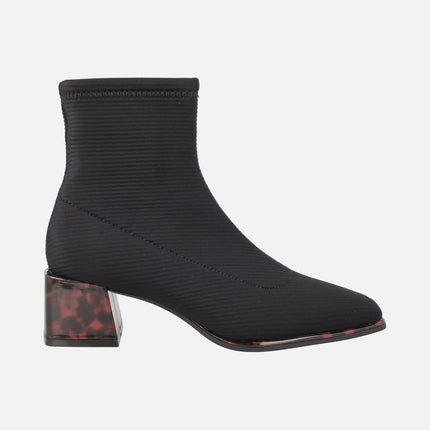 Ankle boots in elastic fabric with tortoiseshell effect heels