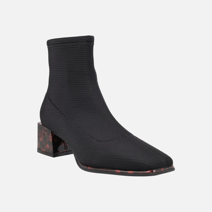 Ankle boots in elastic fabric with tortoiseshell effect heels