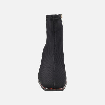 Ankle boots in elastic fabric with tortoiseshell effect heels