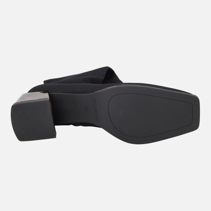 Botas altas en tejido elástico negro con tacones efecto carey