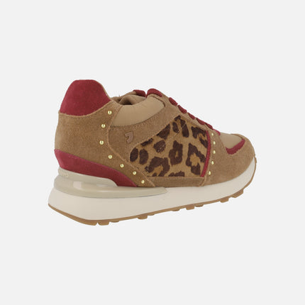 Zapatillas deportivas con cuña interior en combinado animal print