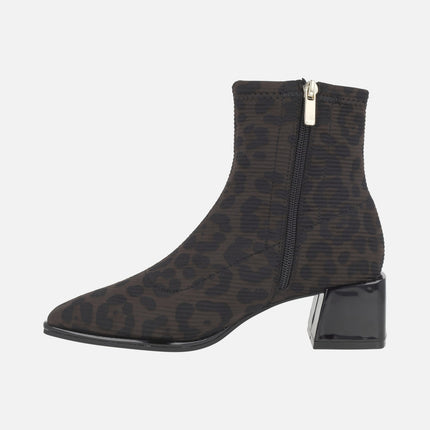 Heeled ankle boots in elastic animal print fabric