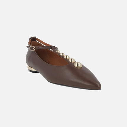 Leather ballerinas with strap crossing the instep and gold studs
