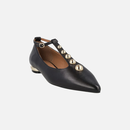 Leather ballerinas with strap crossing the instep and gold studs