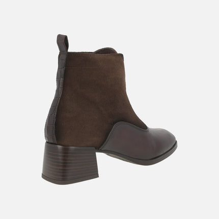 Heeled ankle boots for women in combined leather and suede with central zipper