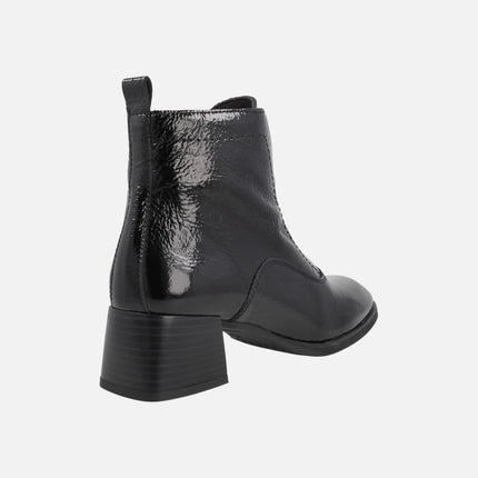 Botines de tacón para mujer en charol negro con cierre de cremallera central