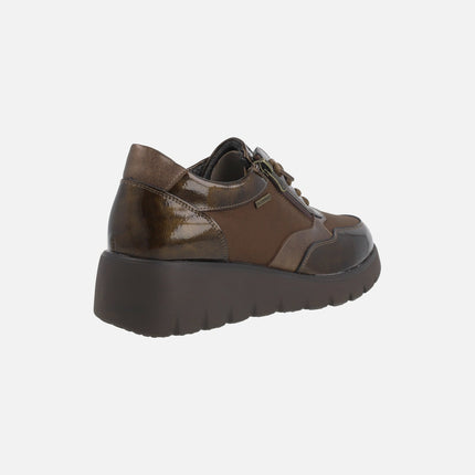 Zapatos deportivos multi material con membrana impermeable