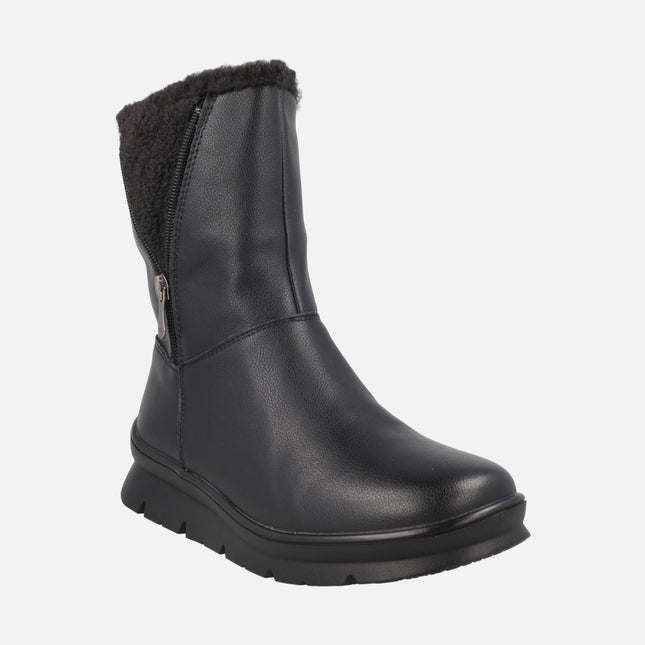 Botas de piel de caña baja con membrana impermeable y detalle de cremallera
