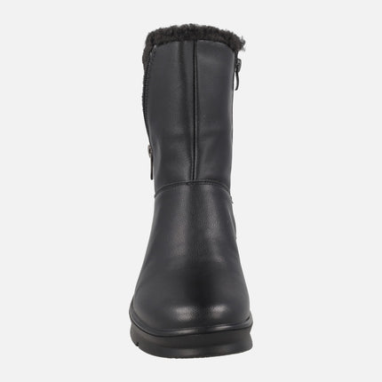 Botas de piel de caña baja con membrana impermeable y detalle de cremallera