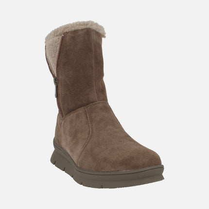 Botas de piel de caña baja con membrana impermeable y detalle de cremallera