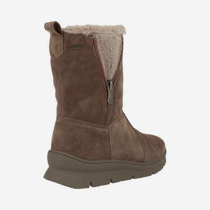 Botas de piel de caña baja con membrana impermeable y detalle de cremallera