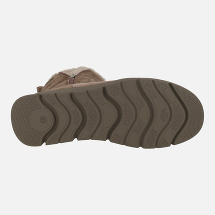 Botas de piel de caña baja con membrana impermeable y detalle de cremallera