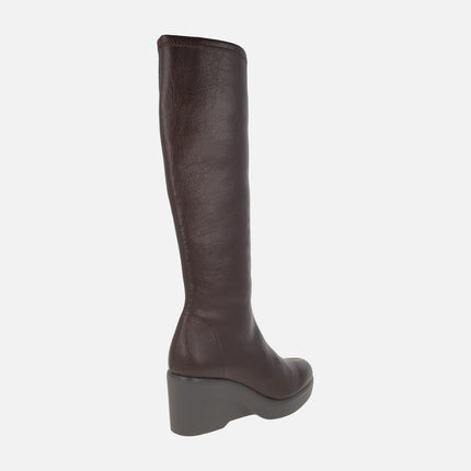Wedged high boots in leather effect fabric with Eco Dry solutions