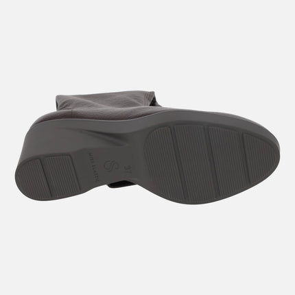 Wedged high boots in leather effect fabric with Eco Dry solutions