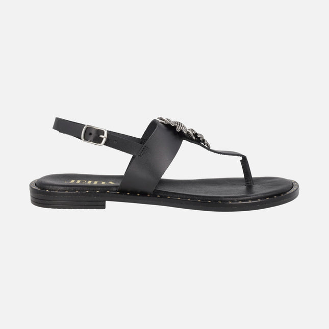 Sandalias de dedo en piel negra con flores plateadas