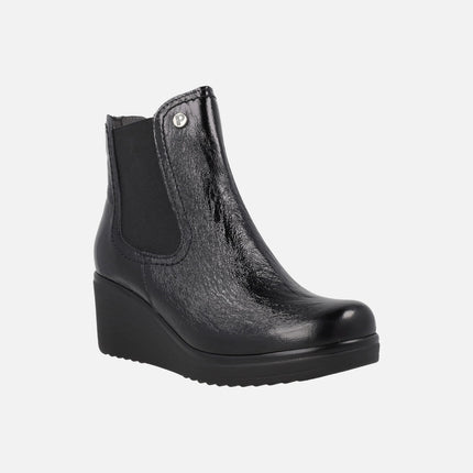 Women's black patent leather ankle boots with 6 cm wedge