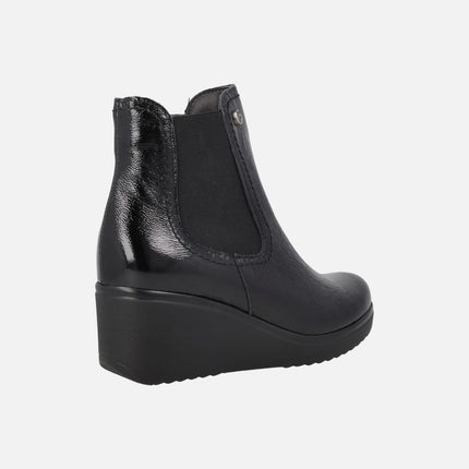 Women's black patent leather ankle boots with 6 cm wedge