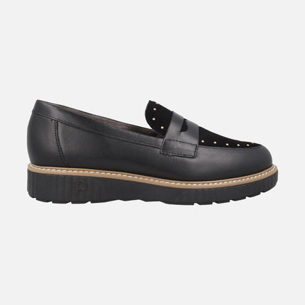 Black leather loafers with suede trim and studs