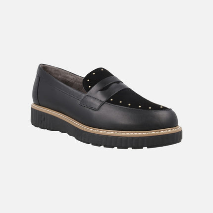 Black leather loafers with suede trim and studs