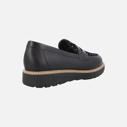 Black leather loafers with suede trim and studs