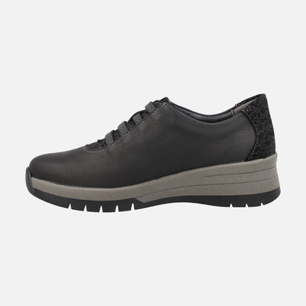 Comfort sneakers for women in black leather with elastic closure