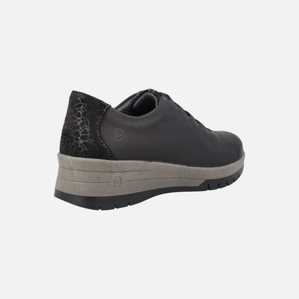 Comfort sneakers for women in black leather with elastic closure