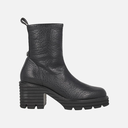 Heeled ankle boots in elastic Water repellent materials