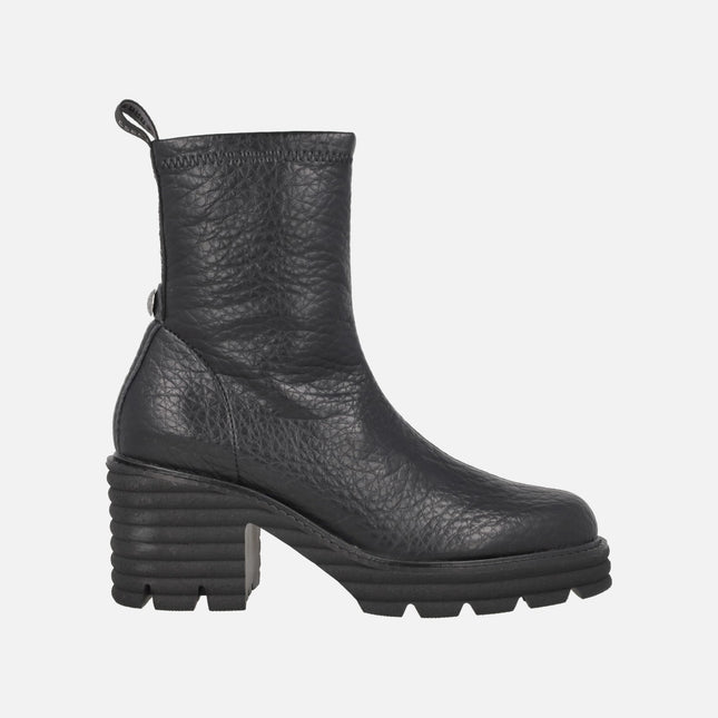 Heeled ankle boots in elastic Water repellent materials