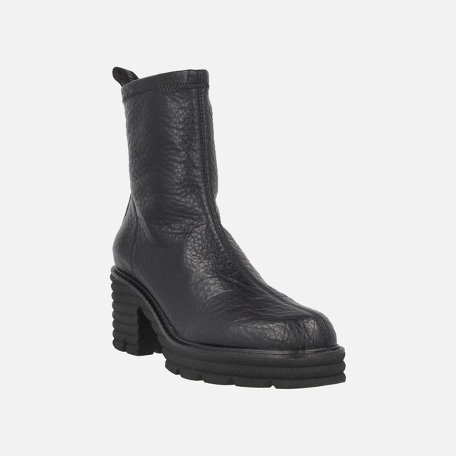 Heeled ankle boots in elastic Water repellent materials