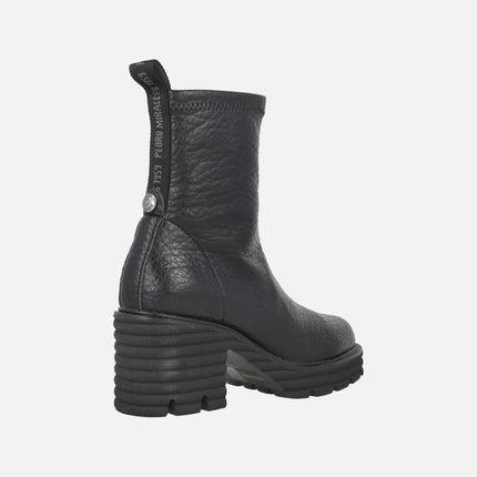 Heeled ankle boots in elastic Water repellent materials
