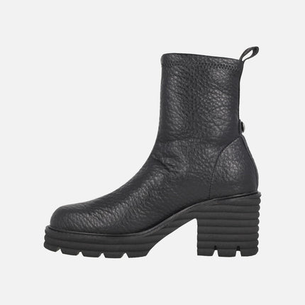 Heeled ankle boots in elastic Water repellent materials