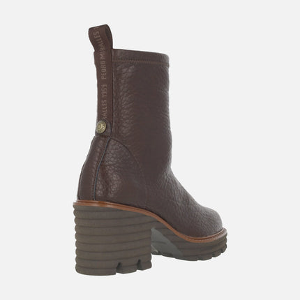 Heeled ankle boots in elastic Water repellent materials