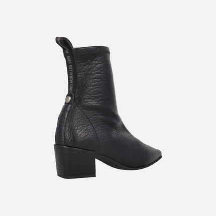 Reznos cowboy style ankle boots in elastic materials with an embossed leather effect