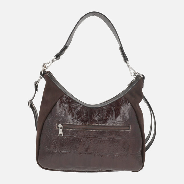 Leather bags with double handles in a combination of croco print and suede 