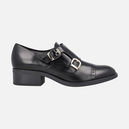 Zapatos para mujer en piel negra con hebillas doradas