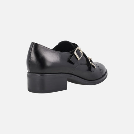 Zapatos para mujer en piel negra con hebillas doradas