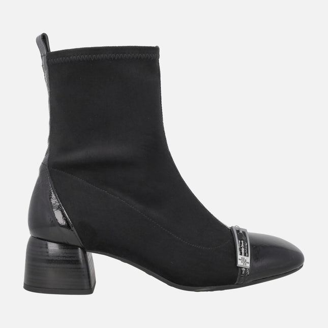 Varsovia Low-heeled ankle boots with elastic leg in black combination 