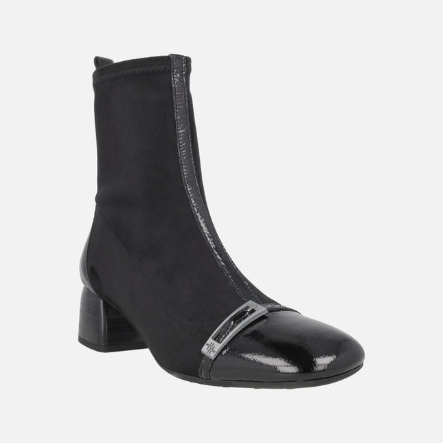 Varsovia Low-heeled ankle boots with elastic leg in black combination 