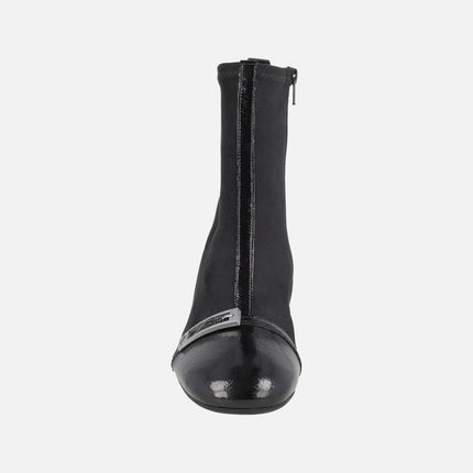 Varsovia Low-heeled ankle boots with elastic leg in black combination 