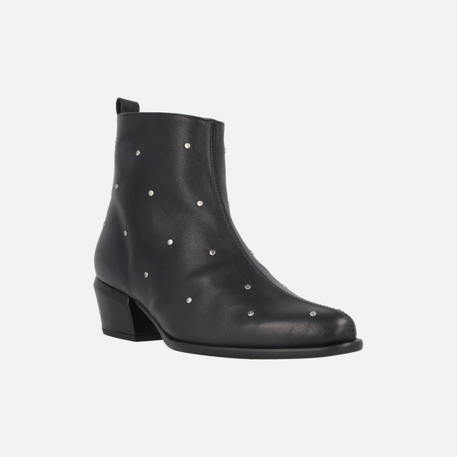 Black leather ankle boots with silver studs
