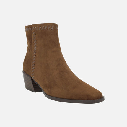 Heeled ankle boots in suede leather with leather stitching