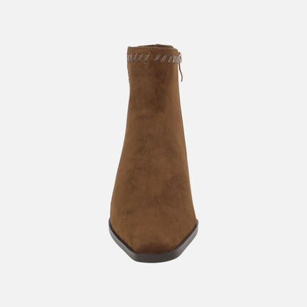 Heeled ankle boots in suede leather with leather stitching